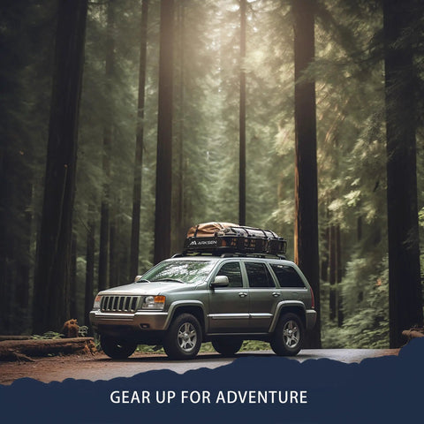 SUV with Slim Roof Rack Cargo Basket 64x23x6 Inches in forest setting, ideal for camping gear and outdoor adventure transport.