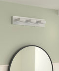 Dimmable LED Vanity Light Three Light Modern Acrylic Stainless Steel Fixture For Bathroom Vanity With Easy Wall Dimmer Switch And Slick Contemporary Style, above a round mirror on a green wall