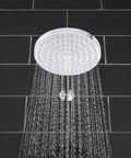 Awaken 8 Inch Single Function Rain Showerhead With Adjustable Swivel Ball Joint For Precise Spray And Legit Drenching Full Coverage Rainfall, 1.75 GPM, Fixed Round Design, MasterClean Sprayface, Polished Chrome spraying water.