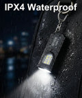 Three Pack Bright Rechargeable Keychain Flashlights With Clip And Magnetic Base Mini LED Key Ring Light in rain shown attached to bag
