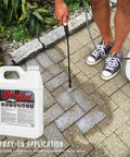 Spraying Knockout Commercial Grade Concrete Driveway Sealer Featuring Silane And Siloxane Formula on pavers for water protection.