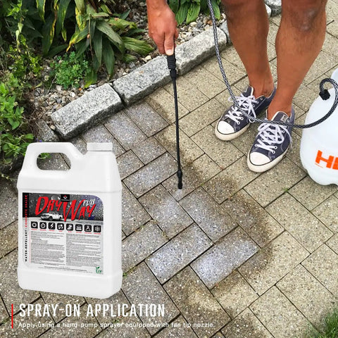 Spraying Knockout Commercial Grade Concrete Driveway Sealer Featuring Silane And Siloxane Formula on pavers for water protection.