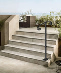 Rock Solid Outdoor Single Post Handrail Wrought Iron Step Railing Black Finish for One or Two Porch Steps on outdoor stairs.