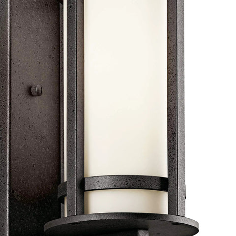 Close-up of the Outdoor Wall Light With Opal Etched Glass In Anvil Iron Finish, modern lantern style, 11 inch tall, weatherproof.