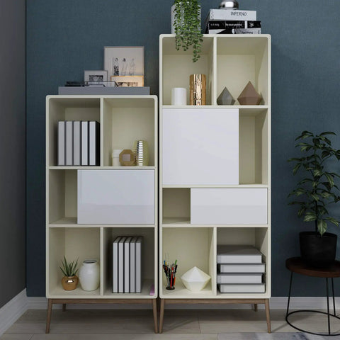Modern beige storage shelves with decorative items in a living room corner