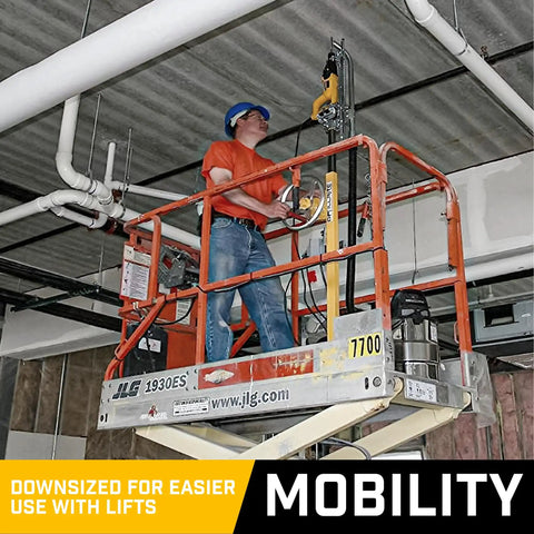 Hella Smooth Overhead Drill Press For Concrete With Seven Foot Reach integrated with a scissor lift in use at height.
