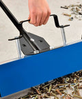 Rugged 18 Inch Magnetic Floor Sweeper With Big Wheels Rolling Smooth On Asphalt Concrete Grass And Gravel Fast Dump Lever handle gripping above collected metal bolts.