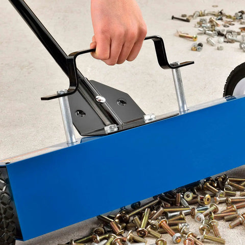 Rugged 18 Inch Magnetic Floor Sweeper With Big Wheels Rolling Smooth On Asphalt Concrete Grass And Gravel Fast Dump Lever handle gripping above collected metal bolts.