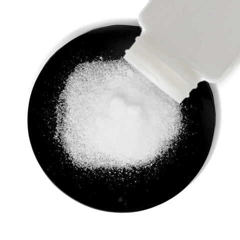 DIY PCB Etchant Dry Powder 8 Oz in space saver bottle pouring odorless fine crystals onto surface for circuit boards