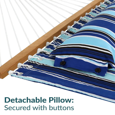 Close-up of Quilted Double Outdoor Hammock With Spreader Bars 74x55 Inch Bed 450 Lb Capacity, showing striped fabric and pillow.
