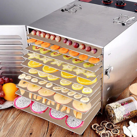 Heavy Duty PTFE Dehydrator Sheets 14 Inch Nonstick Baking Mats And Oven Liners For BBQ Hot Plate in a dehydrator with dried fruits.