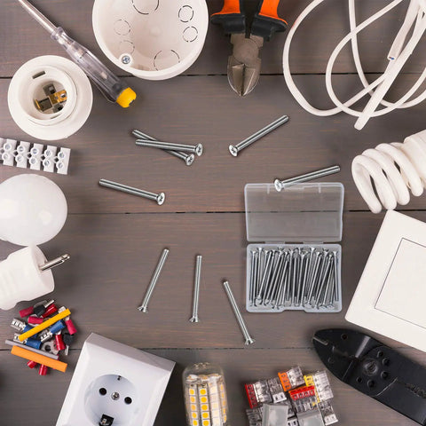 30 Pack Extra Long Electrical Outlet Screws In Mixed Sizes 1.5 Inches on table with tools and electrical parts for installation.