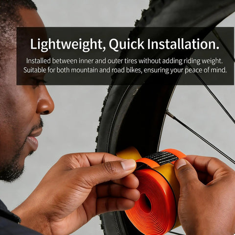 Person installing Two Pack Bike Tire Liners With Self Adhesive Puncture Proof TPU Tube Protectors 40mm on bicycle wheel.