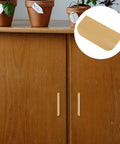 Concealed Zinc Alloy Cabinet Pull Handle Set 80mm Long Arc Edge With Brushed Gold Finish 10 Pack No Drill Install shown on cabinet