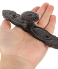 Hand holding Vintage Cast Iron Drawer Pulls For Wardrobe And Cabinets, Antique Dresser Handles, Rustic Hardware For Home Renovation.