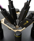 Four SQ10 digital probes with test wires on a PCB, for electronics prototyping and repairs, hands-free workbench tool.
