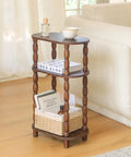 Three Tier Narrow Side Table With Storage For Small Spaces beside a couch with books and a tea cup in rustic brown