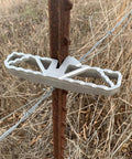 Heavy Duty Aluminum T Post Fence Step With Integrated Nylon Pouch Rock Solid Grip for crossing wire fences outdoors.