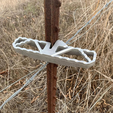 Heavy Duty Aluminum T Post Fence Step With Integrated Nylon Pouch Rock Solid Grip for crossing wire fences outdoors.