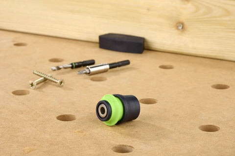 Quick Change Centrotec Chuck For Drills Lightweight And Compact Design on wooden surface with drill bits