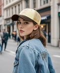 Woman in street wearing Womens Washed Cotton Dad Hat With Adjustable Strap Anti Sweat Band Lightweight And Breathable For Golf