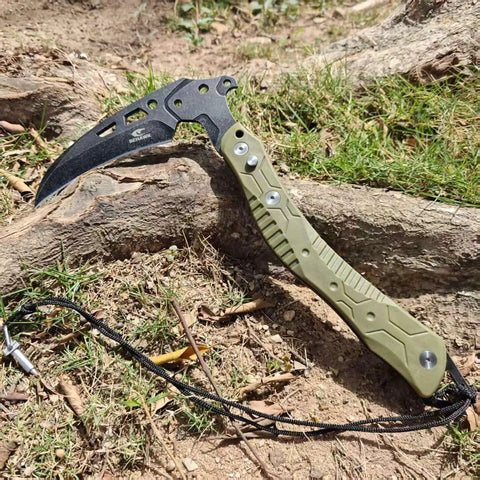 Folding Sickle Knife With Sheath For Tactical Survival And Outdoor Pruning Tools Quick Release With Safety Lock Glass Breaker Portable Army Green Gear On Ground