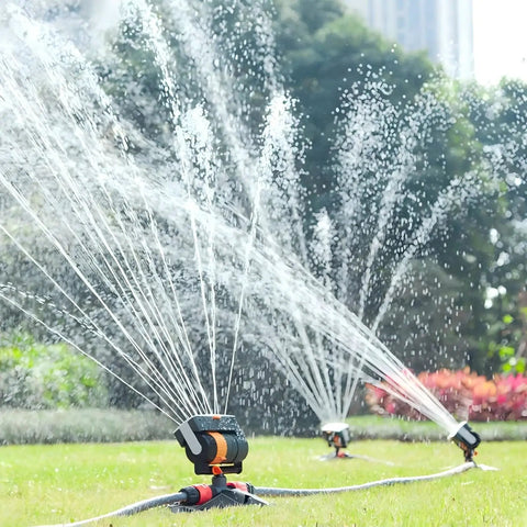 Upgraded 16 Nozzle Oscillating Sprinkler With Dual Zone Water Timer for garden watering in action on a green lawn