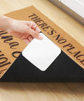Hand applying Four Pack Washable Non Slip Rug Tape Pads For Hardwood Floors And Tiles White Under Carpet Grip To Prevent Curling