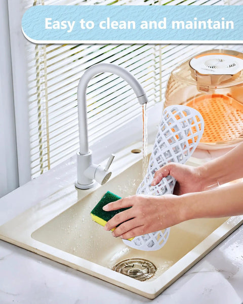 Person cleaning Two Pack Silicone Sink Protectors For Kitchen Sink With Trellis Pattern, 13 By 11 Inches, under faucet