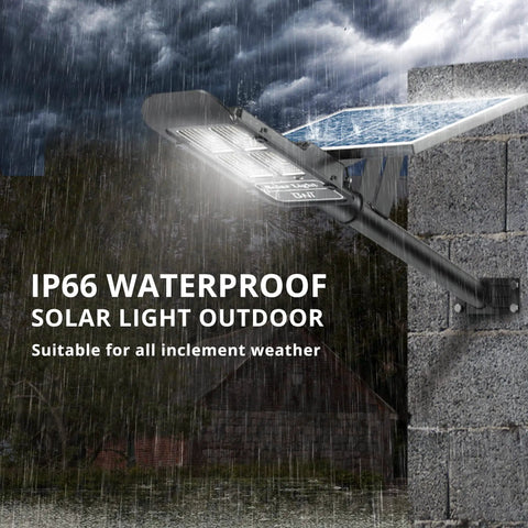 Solar Street Light 300W Outdoor Flood Light With 30000LM on wall during rain, weatherproof aluminum housing visible