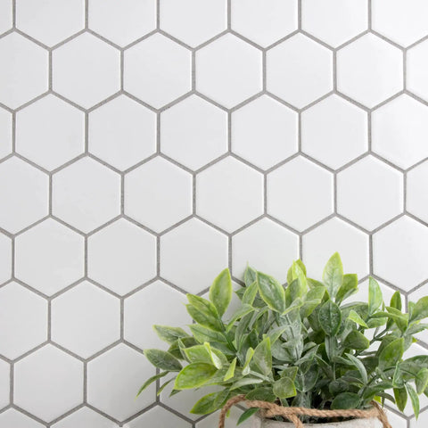 2 Inch Hex Glossy White Porcelain Mosaic Tile For Floors And Walls Mesh Mounted 11-1/8 By 12-5/8 Inches with plant decor