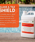 Glass And Tile Shield Gallon Protectant bottle by pool, labeled for calcium and mineral prevention on tiles, grout, and stone.