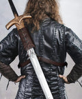 Rear view of person wearing Dope Medieval Leather Sword Holster Belt with Premium Faux Leather Adjustable Frog and Shoulder Strap