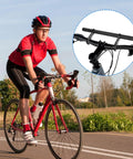 Cyclist on road with inset image of Ultra Long Bike Handlebar Extender Eleven Point Eight Inches Aluminum Alloy Cross Bar