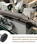 M4 x 6mm Knurled Thumb Screw Clamping Knobs With Plastic Hand Grip Black shown with industrial machinery application