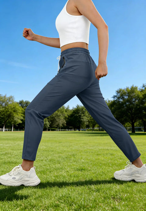 Side view of woman wearing Lightweight Breathable Hiking Pants For Women Over 50 With Zipper Pockets Stretch Active Quick Dry Travel Pants For Camping Fishing And Workouts Comfortable Fit Navy Blue