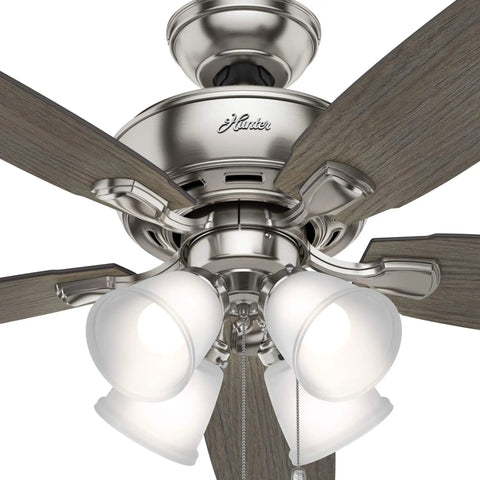 Close-up of a 52 Inch Indoor LED Ceiling Fan With Pull Chain Lights, Brushed Nickel Finish, Five Blades.
