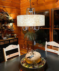 Cozy dining area with Gwenyth 20 Inch Modern Farmhouse 5 Light Drum Chandelier With Oatmeal Linen Shade Rustic Arched Metal Hanging Fixture