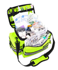 Lightning X mid-sized EMT bag, fluorescent yellow, opened to reveal 200+ BLS medical supplies.