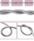 Close-up of flexible, tangle-free stainless steel garden hose with 10 function spray nozzle, 100 ft no kink metal water hose in coils.