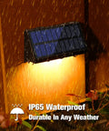 Solar Fence Post Lights 6 Pack, Waterproof Outdoor LED Fence Lighting in rainfall displaying IP65 waterproof durability.