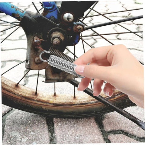 Top Tier 10-Piece Stainless Steel Extension Springs Kit Delivers Killer Strength For DIY Gear, Electric Vehicles And Heavy Machinery With Easy Swap Performance, spring installed on rusty bicycle wheel