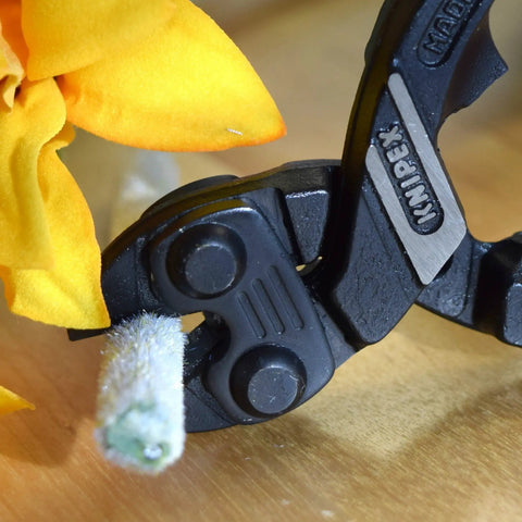 Close-up of CoBolt Compact Bolt Cutter cutting object, 8-inch, multi-component design, comfort grip for tradesmen and DIY pros.