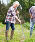 Elderly couple using Japanese Weeding Sickle Hoe With Adjustable Long Handle For Standing Weeding Angular Sickle Garden Tool in field
