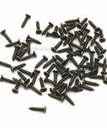 Antique bronze screws for 20 Pack Antique Bronze Zinc Alloy Label Frame Drawer Pulls for Drawers and Cabinets, scattered on white background.