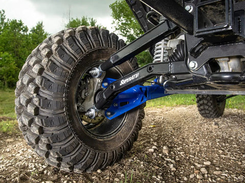 High Clearance Boxed Rear Radius Arms For Honda Talon 1000X And 1000X 4 2019 2020 Models With Seven Eighths Inch Adjustable Heim Joints High Strength Alloy Steel And Zinc Plated Chromoly Bushings For Tougher Smoother Handling. rear suspension arm on off-road tire