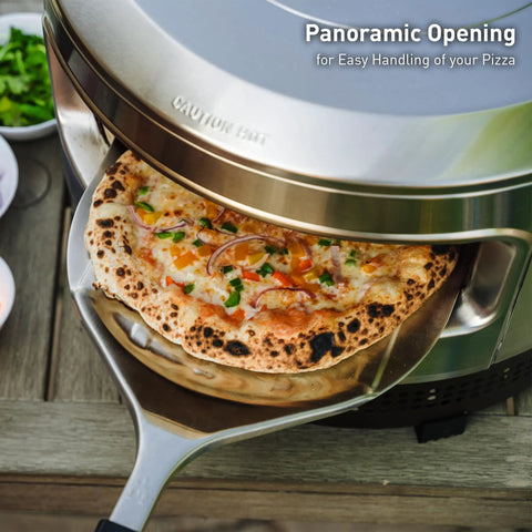 Outdoor Pizza Oven On The Go For Gas Or Propane Cooking, showing pizza being removed from wide mouth opening, stainless steel build