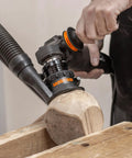 Heavy Duty Power Carving Tool Attachment Featuring A Slick Two Inch Cutting Disc And Adjustable Sanding System in use on timber.