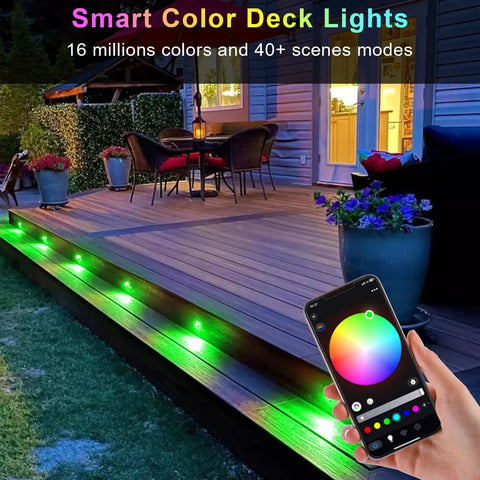 Outdoor view of 30 Pack 1.22 Inch Low Voltage RGBW Deck Lights With WiFi App And Voice Control on wooden deck with smartphone app