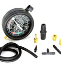 HFS fuel pump tester gauge kit with black round gauge, hose, and brass adapters.